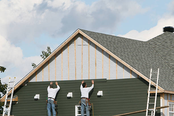 Professional Vinyl Siding technician working in Lemont, PA